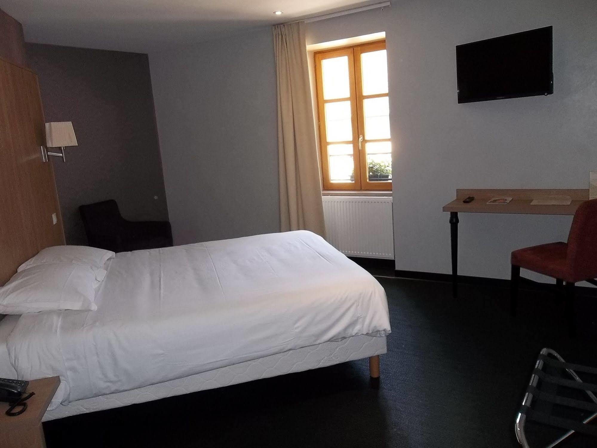 Logis L'Hotel D'Arc Arc-sur-Tille Exterior foto